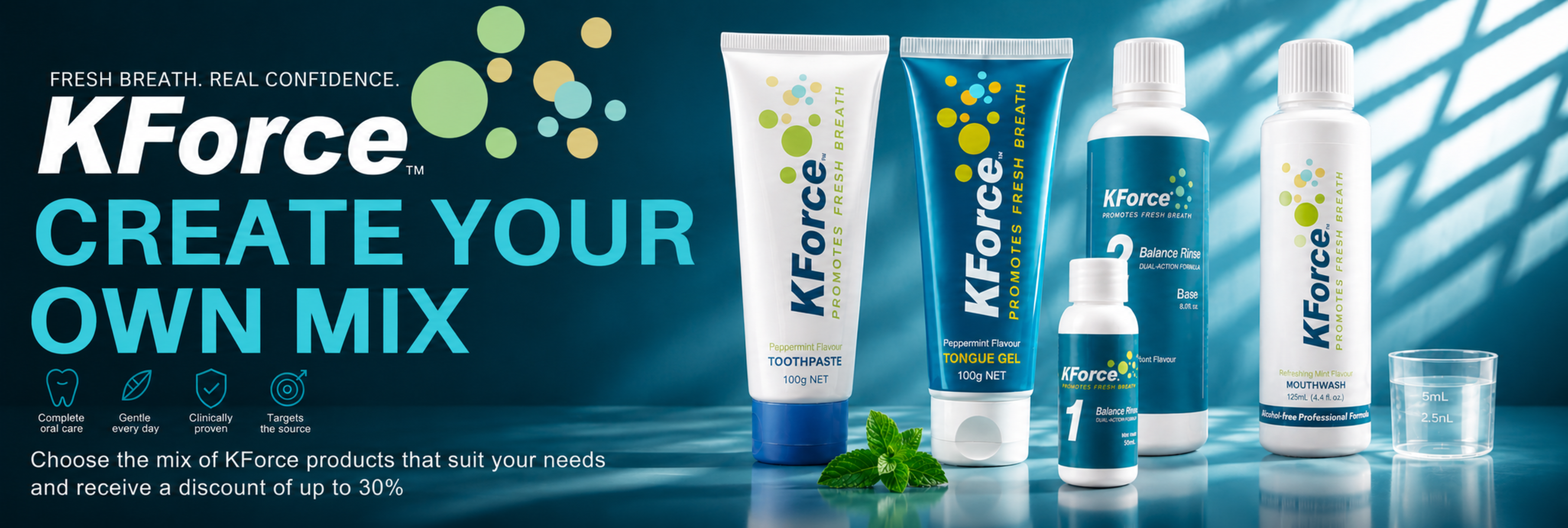 KForce dental care product lineup on a dark blue promotional background. Visible items include several white and blue tubes and bottles, a small clear cup, and a small green sprig, with large text reading 'KForce CREATE YOUR OWN MIX'.